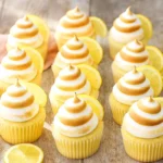Lemon meringue cupcakes with golden meringue topping
