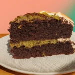 chocolate pistachio kataifi cake with crisp pastry and ganache on plate
