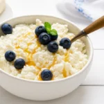 blueberry cottage cheese breakfast bowl with honey